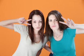 Women with Peace Symbol Hand Signs