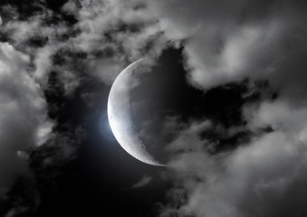 Obraz na płótnie Canvas Half of moon in the night black sky