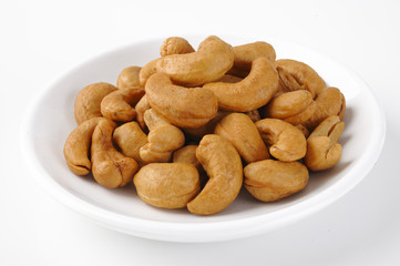 cashew nuts on white dish
