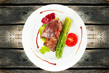 roast meat served on plate