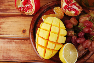 fruits on wooden plate