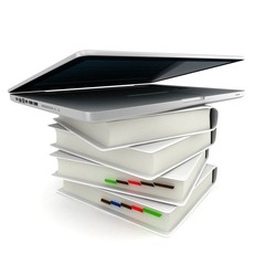 3d laptop sitting on top of books