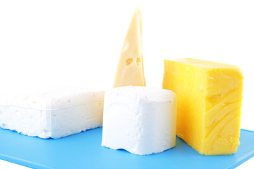 cheeses on blue plate