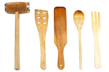 used wooden spatulas and kitchen hammer