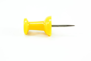 a yellow push pin