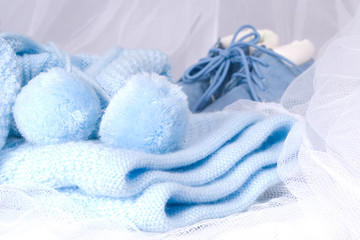 Blue clothes for the newborn boy.
