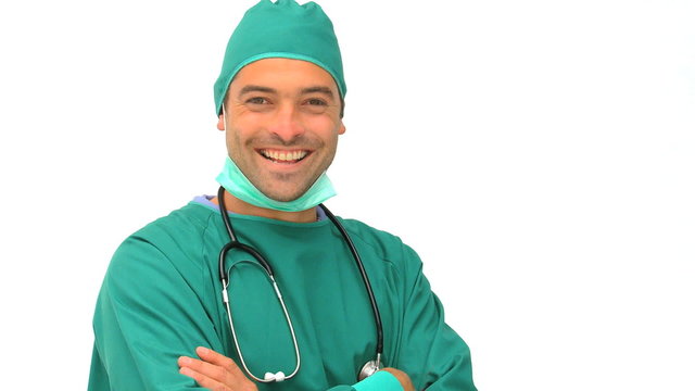 A surgeon against a white background
