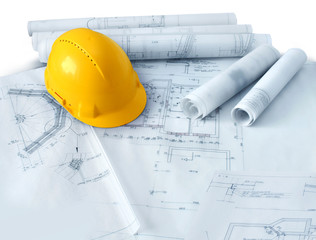 Construction plans and hard hat