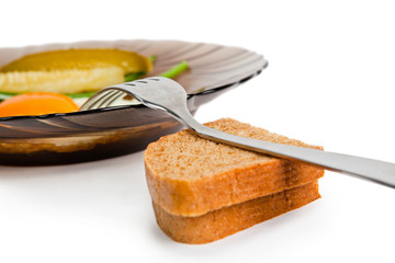 One fried eggs with slices of wholegrain toast