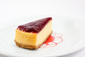 a slice of raspberry cheesecake