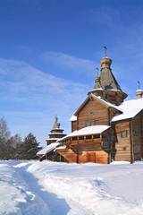 wooden chapel in winter village