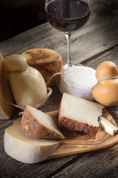 variety of cheese and red wine