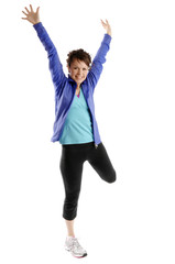 Young sporty woman exercises