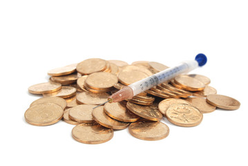 Coins and syringe