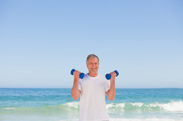 Elderly man doing his exercises