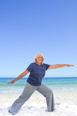 Retired woman doing her stretches