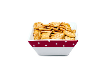 Bowl of cookies, isolated on a white background.