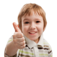 Child gesturing thumb up