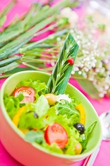 bowl with a salad on the table