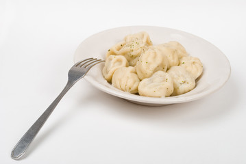 Dumplings In The Dish On A White Background