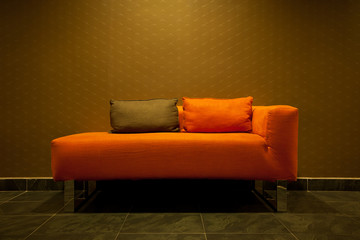 Empty orange sofa