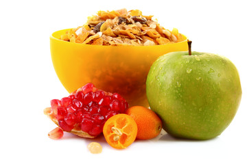 apple, muesli and pomegranate isolated on white