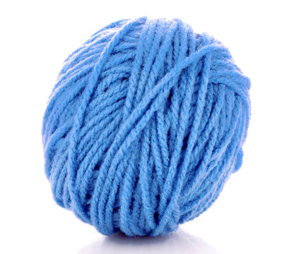Blue ball of woollen thread isolated on white