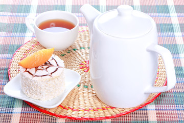 Milk jelly cake with peach and coconut decoration