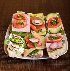 Different sandwiches with vegetables and cheese isolated