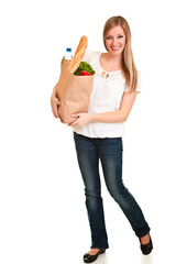 Woman carrying bag of groceries isolated on white