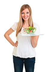 Woman with salad and scales isolated on white