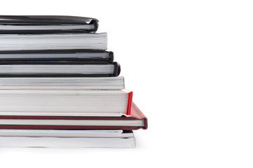 Pile of books isolated on white background