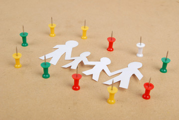 Paper man and push pin