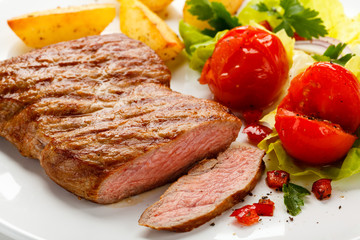 Grilled steak and vegetables