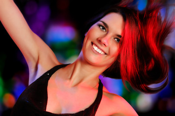 dancing party girl happy young attractive in nightclub