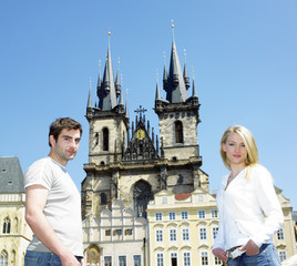 couple in Prague, Tynsky church, Old Town Square, Czech Republic