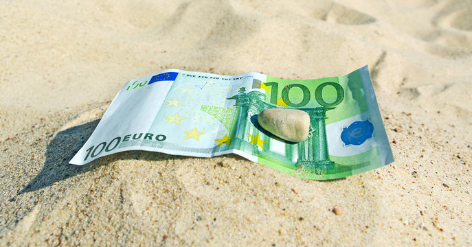Euro on sand.