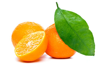 Tangerines with leaves isolated over white