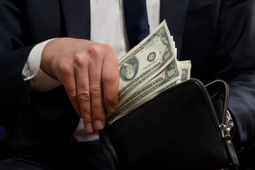 Businessman with money in hands.