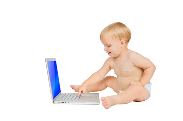Cute little boy with laptop
