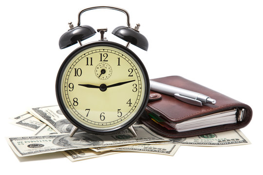 alarm clock and money isolated