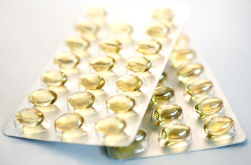 pack of yellow medicine pills