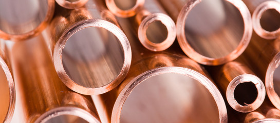 Copper pipes of different diameter - obrazy, fototapety, plakaty