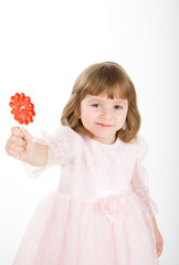 four-year girl in a beautiful pink dress with the big sugar cand