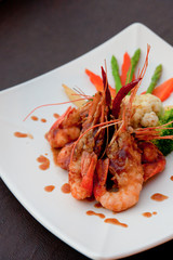 shrimp and sauceon white plate