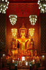 Fototapeta na wymiar Buddha statue in church of Lampoon, north of Thailand