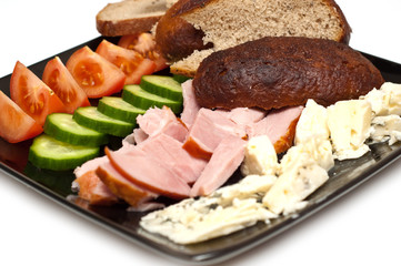 bread, ham, cheese, tomato and cucumber appetizer