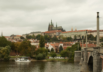 Castle and Charles bridge in Prague at the day time