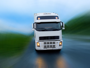 Obraz na płótnie Canvas Motion of truck on the night road