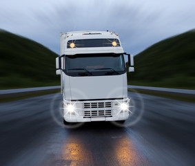 Fototapeta na wymiar Motion of white truck on the night road